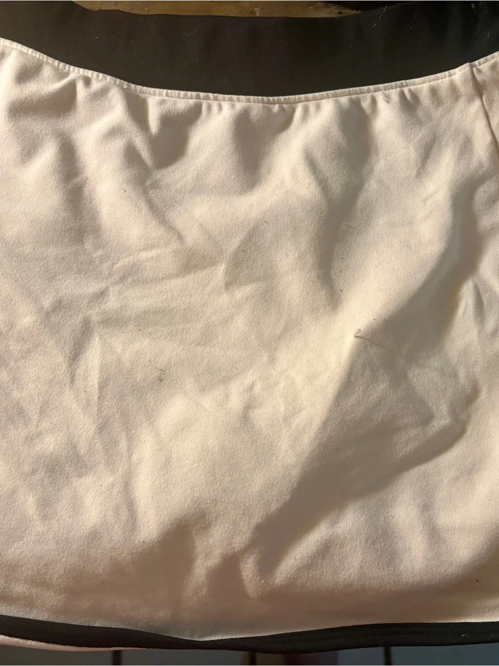 ALO Yoga Women's Athletic Skort in White with Black Trim